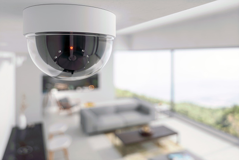 Ceiling security camera overlooking a room